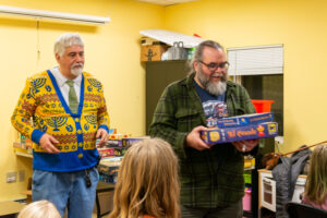  Sean receiving his table leader award....we've gotta play El Grande with expansions in 2024.